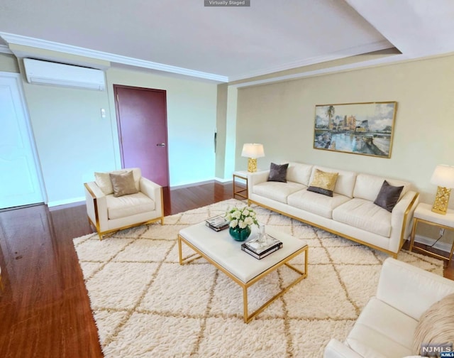 living room with ornamental molding, a wall mounted AC, and dark wood-type flooring