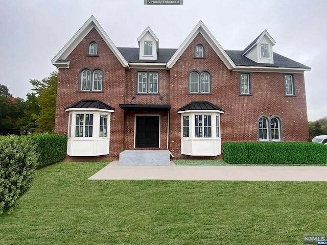 view of front of home with a front lawn