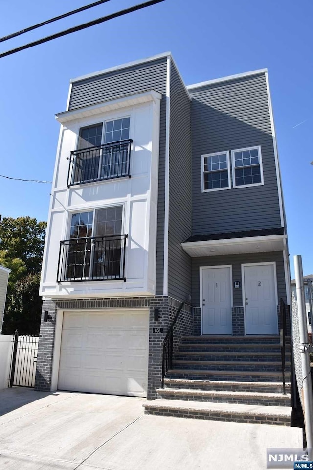 view of front of property with a garage