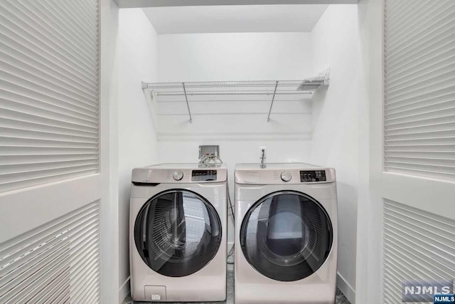 laundry room featuring washer and dryer