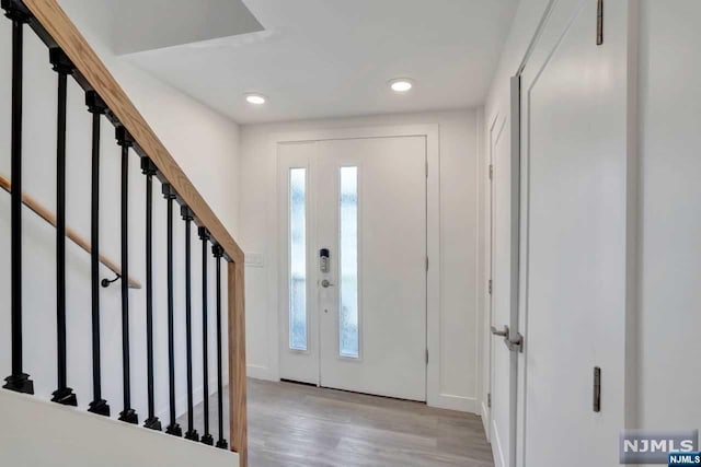 entrance foyer with light hardwood / wood-style flooring