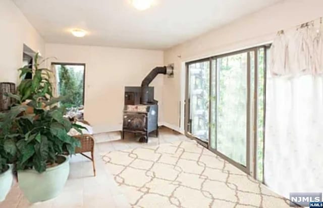 interior space featuring a wood stove