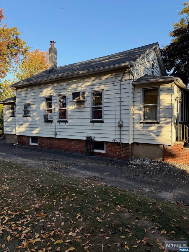 415 Jefferson Ave, Hasbrouck Heights, NJ 07604 - exterior space featuring a wall mounted AC