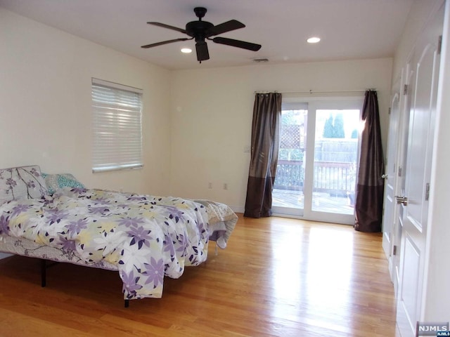 bedroom featuring ceiling fan, access to outside, light wood finished floors, and recessed lighting