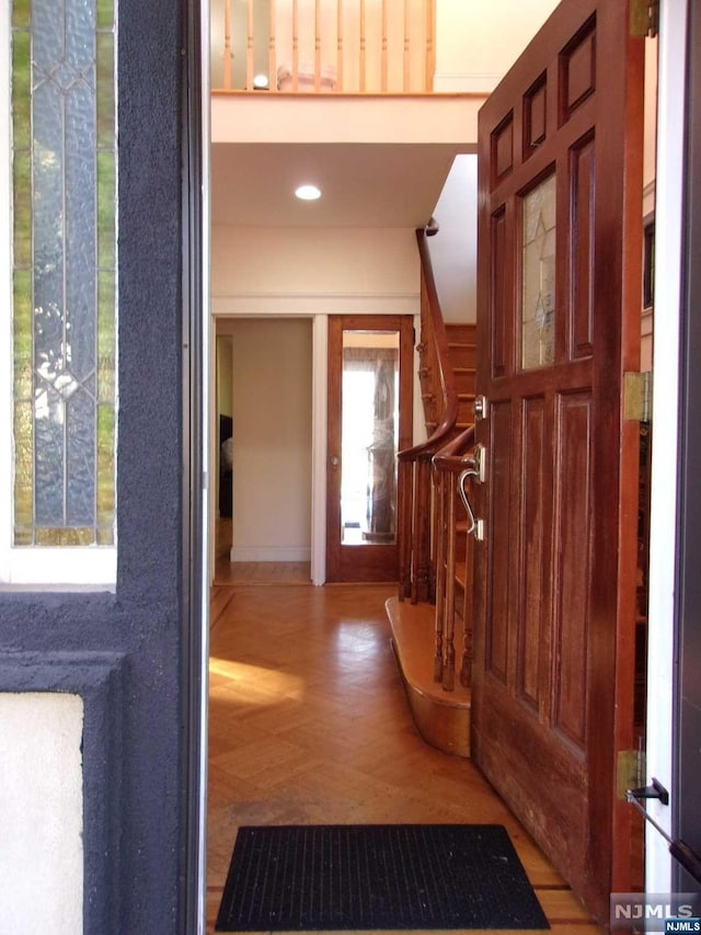 interior space with light parquet floors