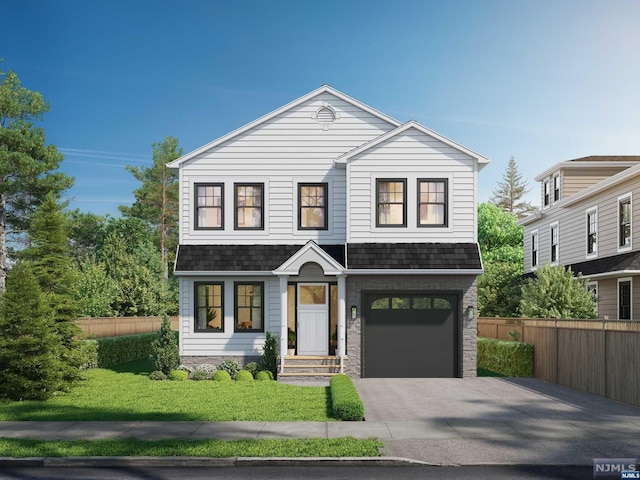 view of front of property featuring a garage and a front lawn