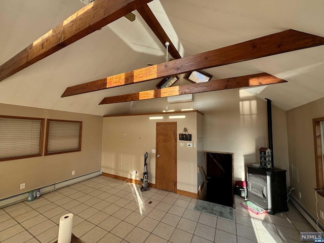 interior space featuring lofted ceiling with beams, a baseboard heating unit, and light tile patterned flooring