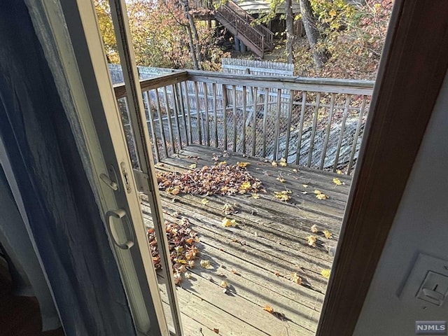 doorway to outside featuring wood-type flooring