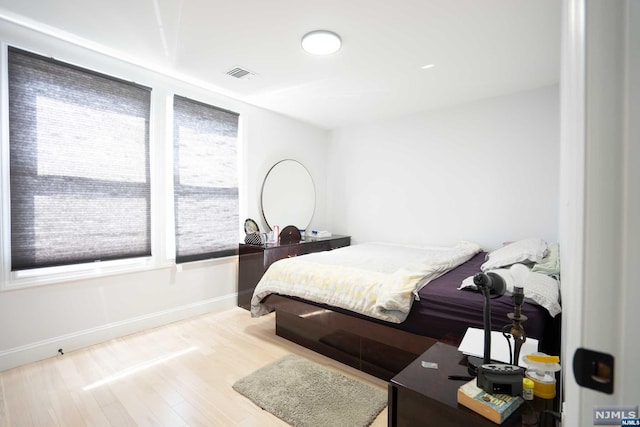 bedroom featuring light hardwood / wood-style floors