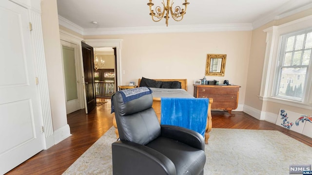 bedroom with multiple windows, ornamental molding, dark hardwood / wood-style floors, and a notable chandelier