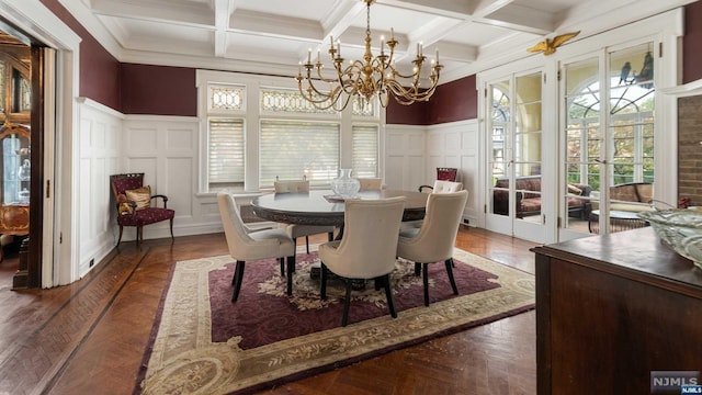 dining area with french doors, plenty of natural light, beamed ceiling, and coffered ceiling