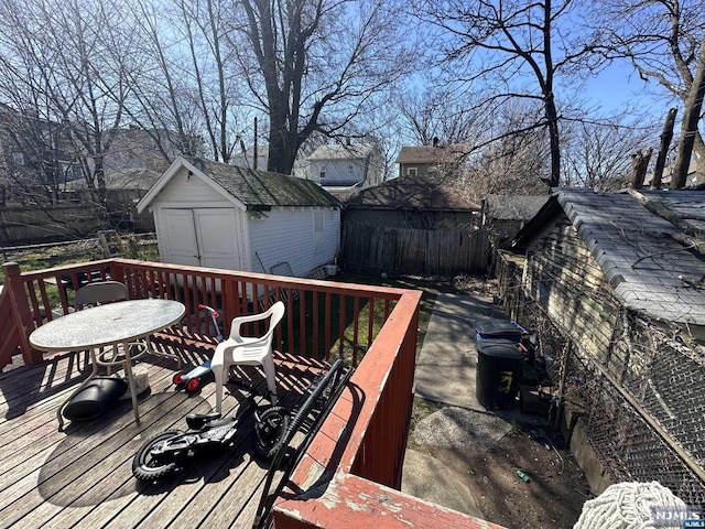 deck with a storage shed