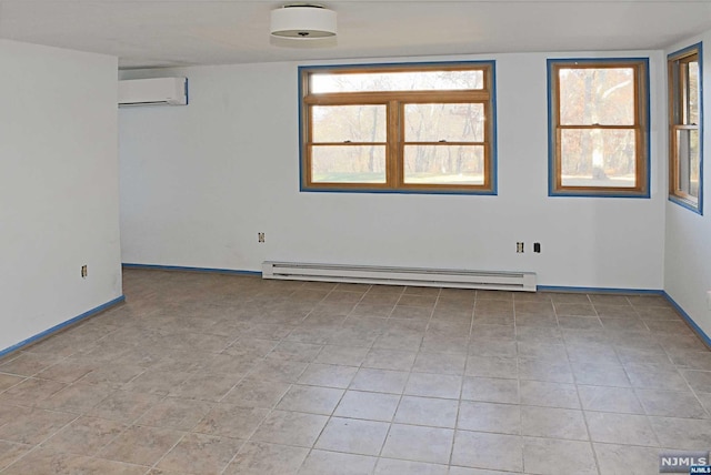 tiled spare room with a wall unit AC and a baseboard heating unit