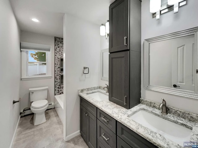 full bathroom featuring baseboard heating, tile patterned flooring, toilet, vanity, and shower / bathtub combination