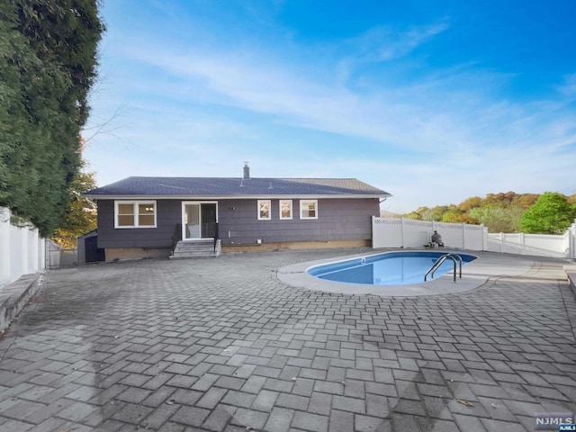 view of swimming pool featuring a patio