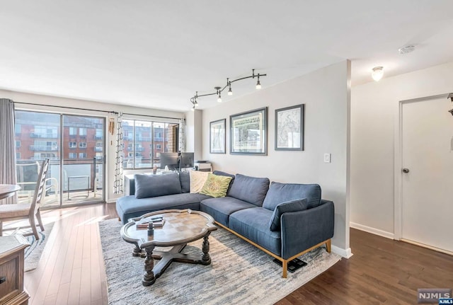 living room featuring dark hardwood / wood-style flooring