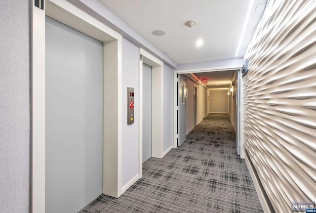 corridor featuring elevator