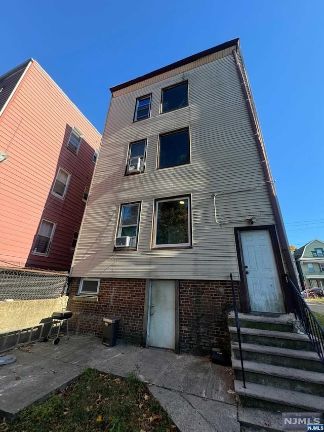 rear view of house with a patio area