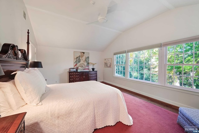 bedroom with wood-type flooring, ceiling fan, and lofted ceiling