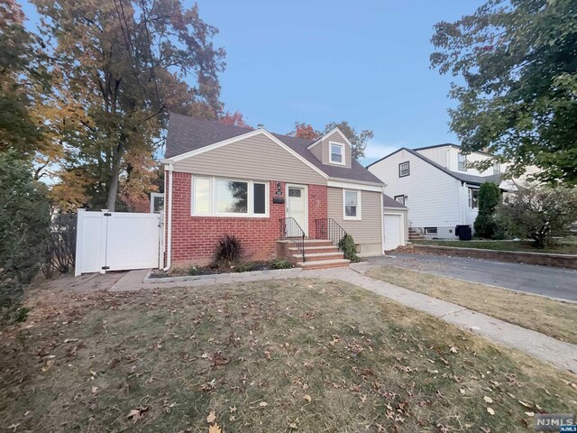 view of front of home with a front lawn