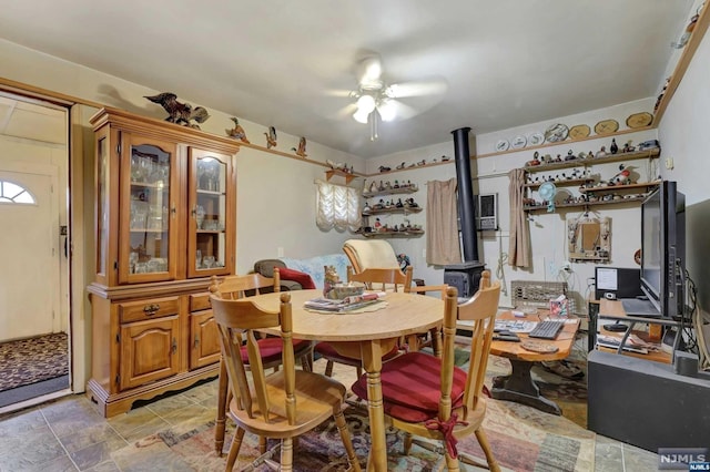 dining space featuring ceiling fan