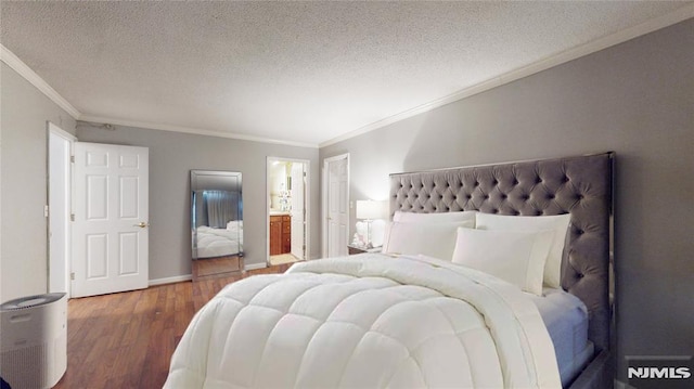 200 Winston Dr Unit 418, Cliffside Park, NJ 07010 - bedroom featuring crown molding, wood finished floors, a textured ceiling, and ensuite bathroom