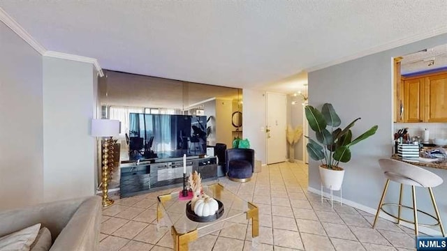 tiled living room with a textured ceiling and ornamental molding