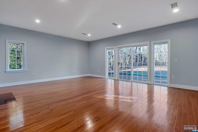 empty room featuring light hardwood / wood-style floors