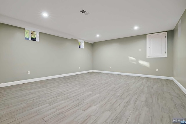 basement with light wood-type flooring