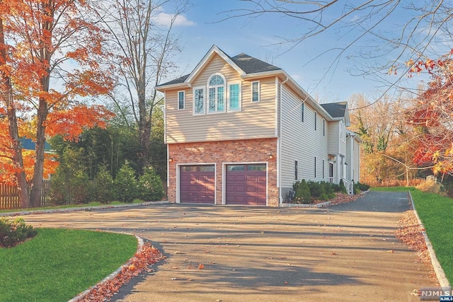 view of property exterior featuring a garage