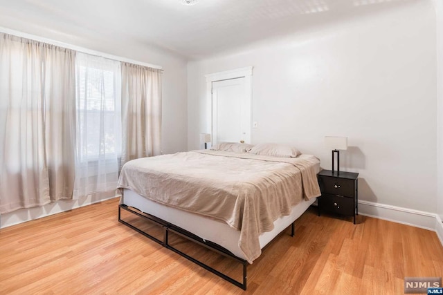 bedroom featuring light hardwood / wood-style floors