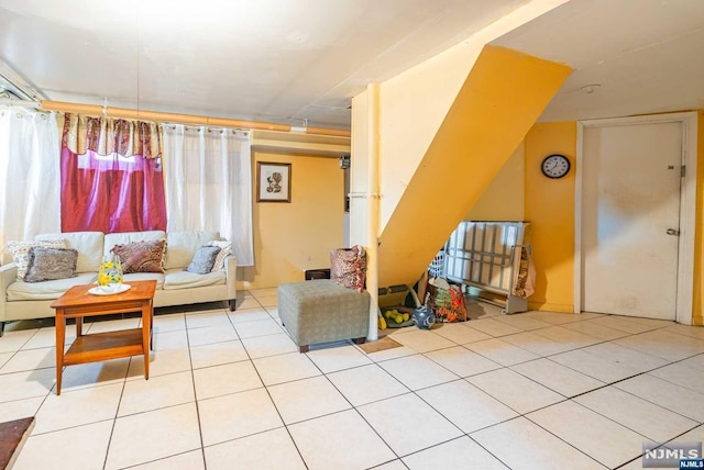 living room with light tile patterned floors