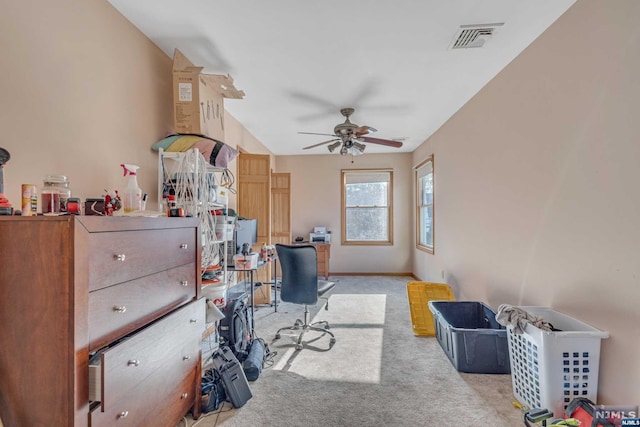 home office featuring ceiling fan and light colored carpet