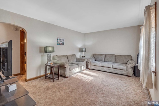 living room with light colored carpet