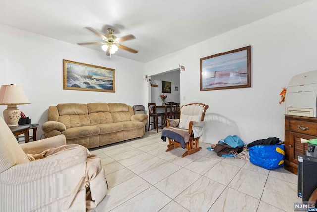 living room featuring ceiling fan