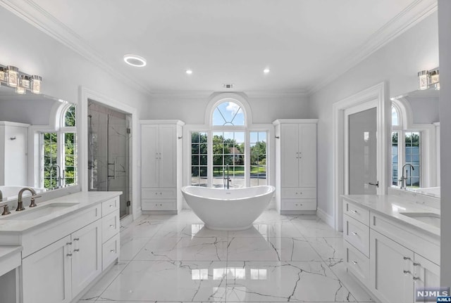 bathroom with vanity, ornamental molding, and plus walk in shower