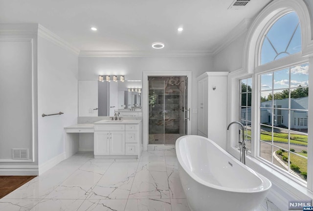 bathroom with separate shower and tub, crown molding, and vanity