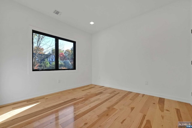 empty room featuring light hardwood / wood-style floors