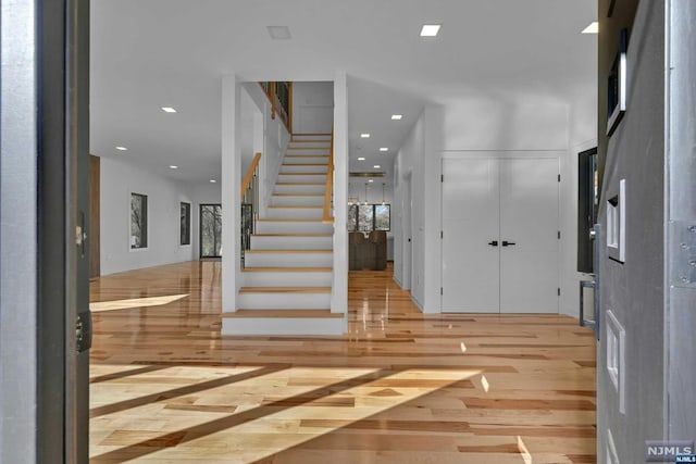 foyer with hardwood / wood-style flooring