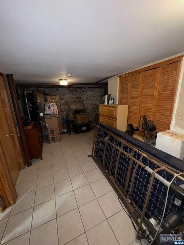 wine cellar with light tile patterned floors