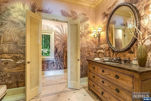 bathroom with vanity and tile patterned floors