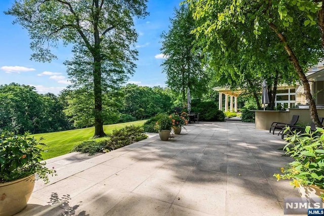 view of patio with a bar