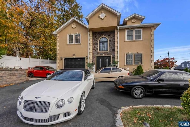 front of property featuring a garage