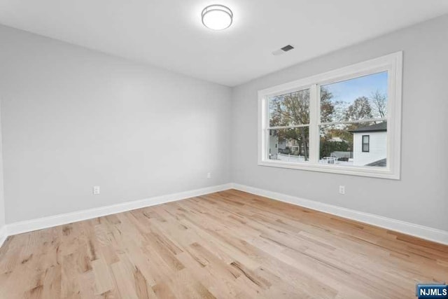 empty room featuring light hardwood / wood-style floors