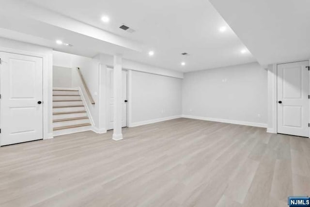 basement with light wood-type flooring