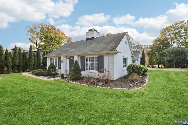 view of property exterior featuring a yard