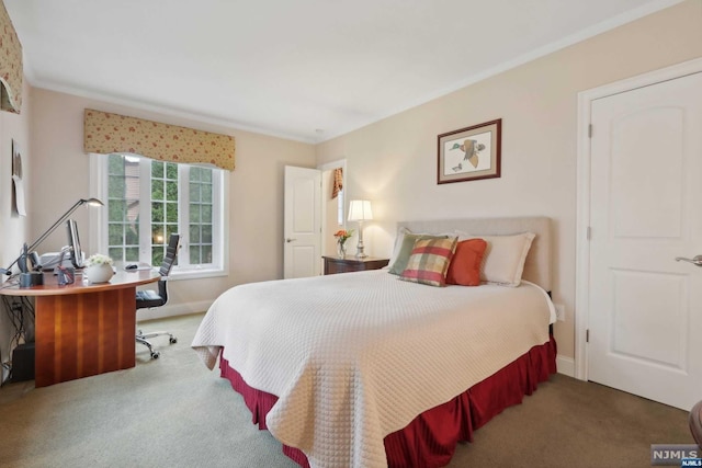 carpeted bedroom featuring ornamental molding