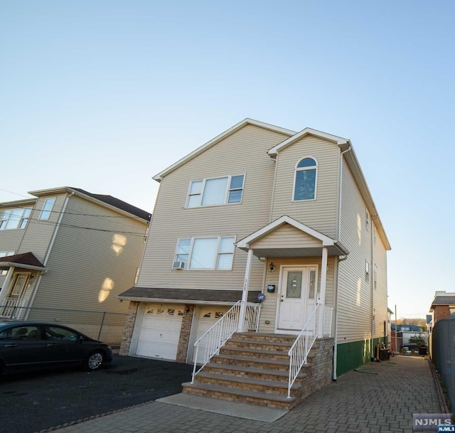 view of front of house with a garage