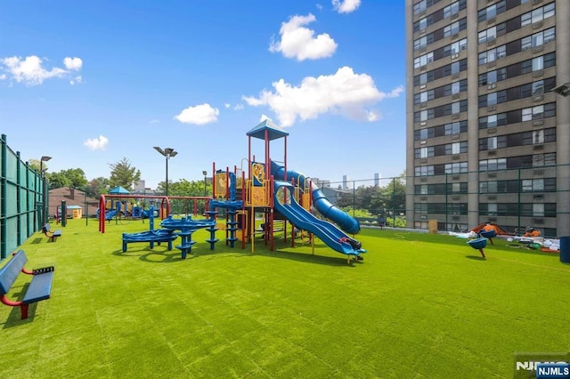 view of playground featuring a yard