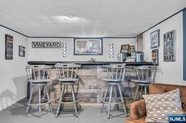 bar featuring hardwood / wood-style floors